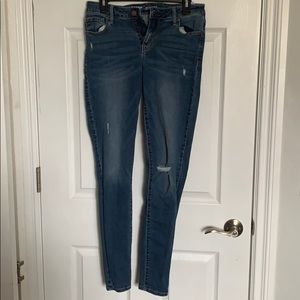 Old navy blue ripped jeans